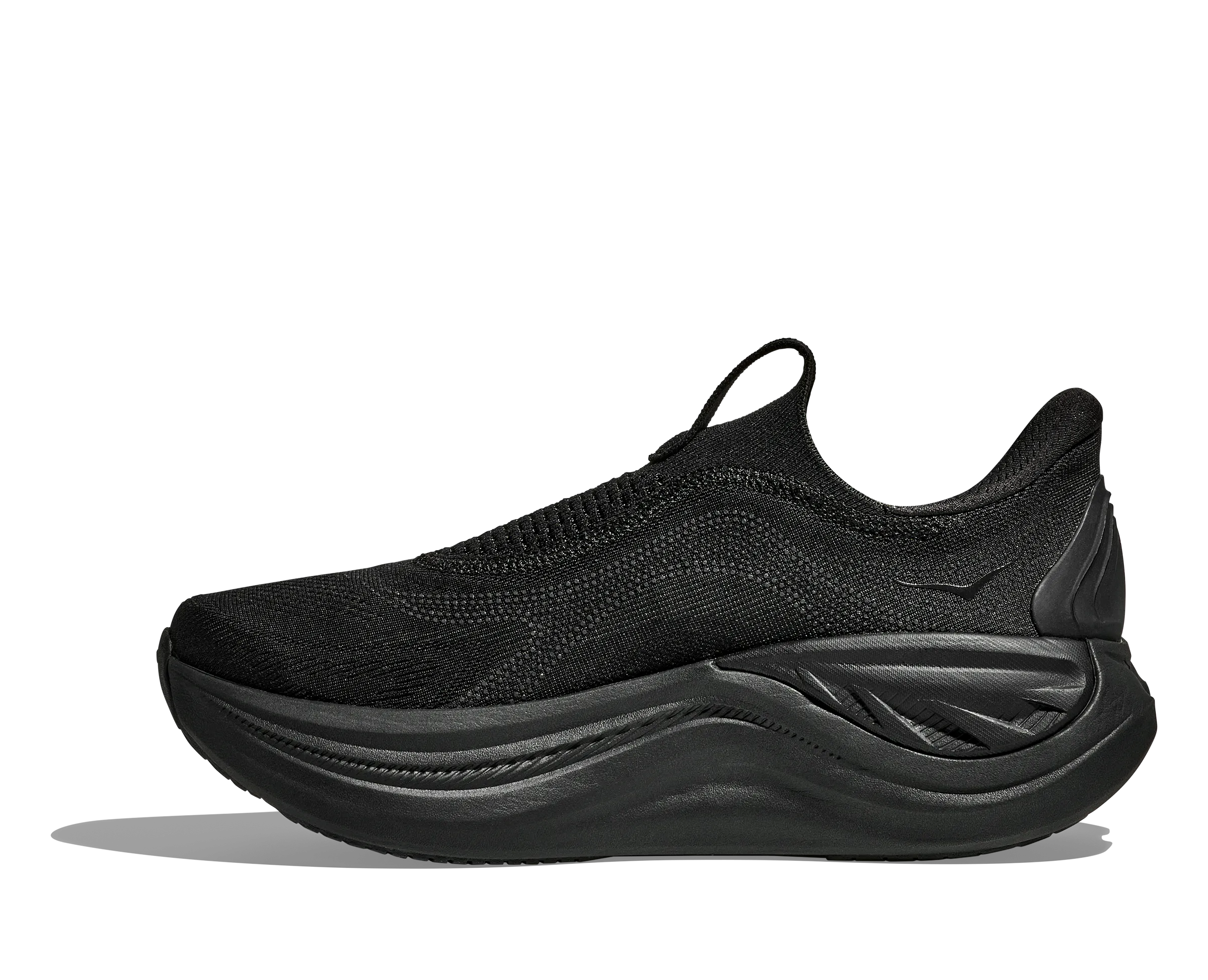 Women's Skyward Laceless - Black / Black running in a salt flat area shoes